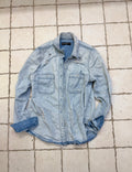 Distressed denim button up shirt